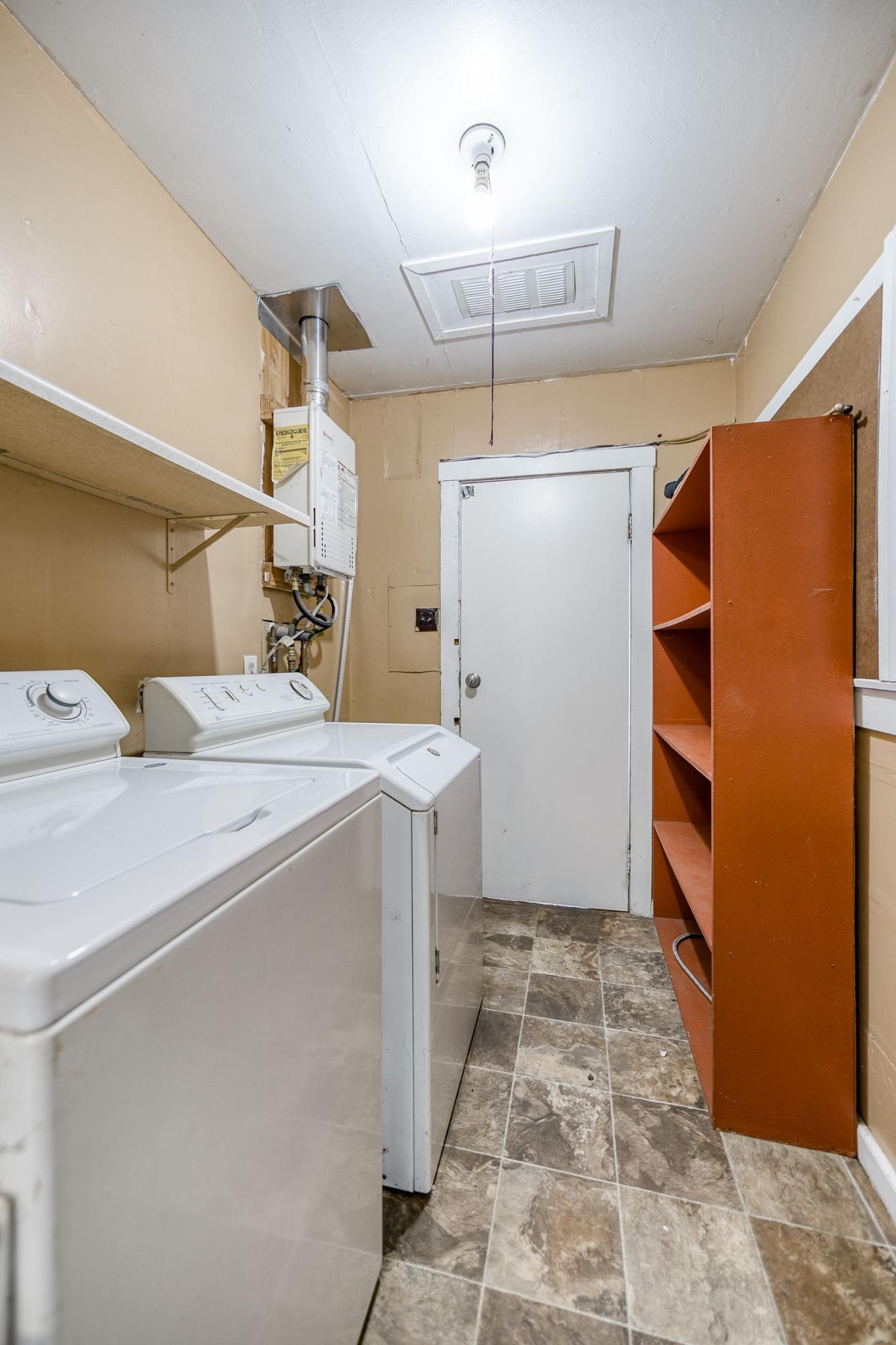 2756 Henderson Road Redding, CA 96002 - Photo 10 of 13 a room with storage and utility