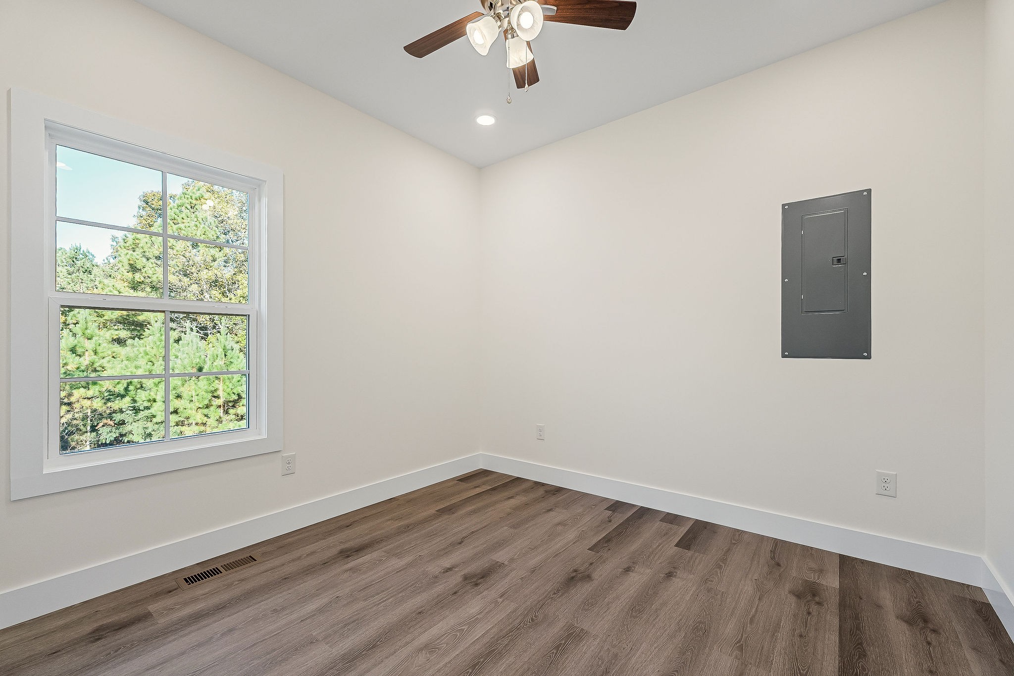 275 Johnson Chapel Road Sparta, TN 38583 - Photo 11 of 21 wooden floor in an empty room with a window