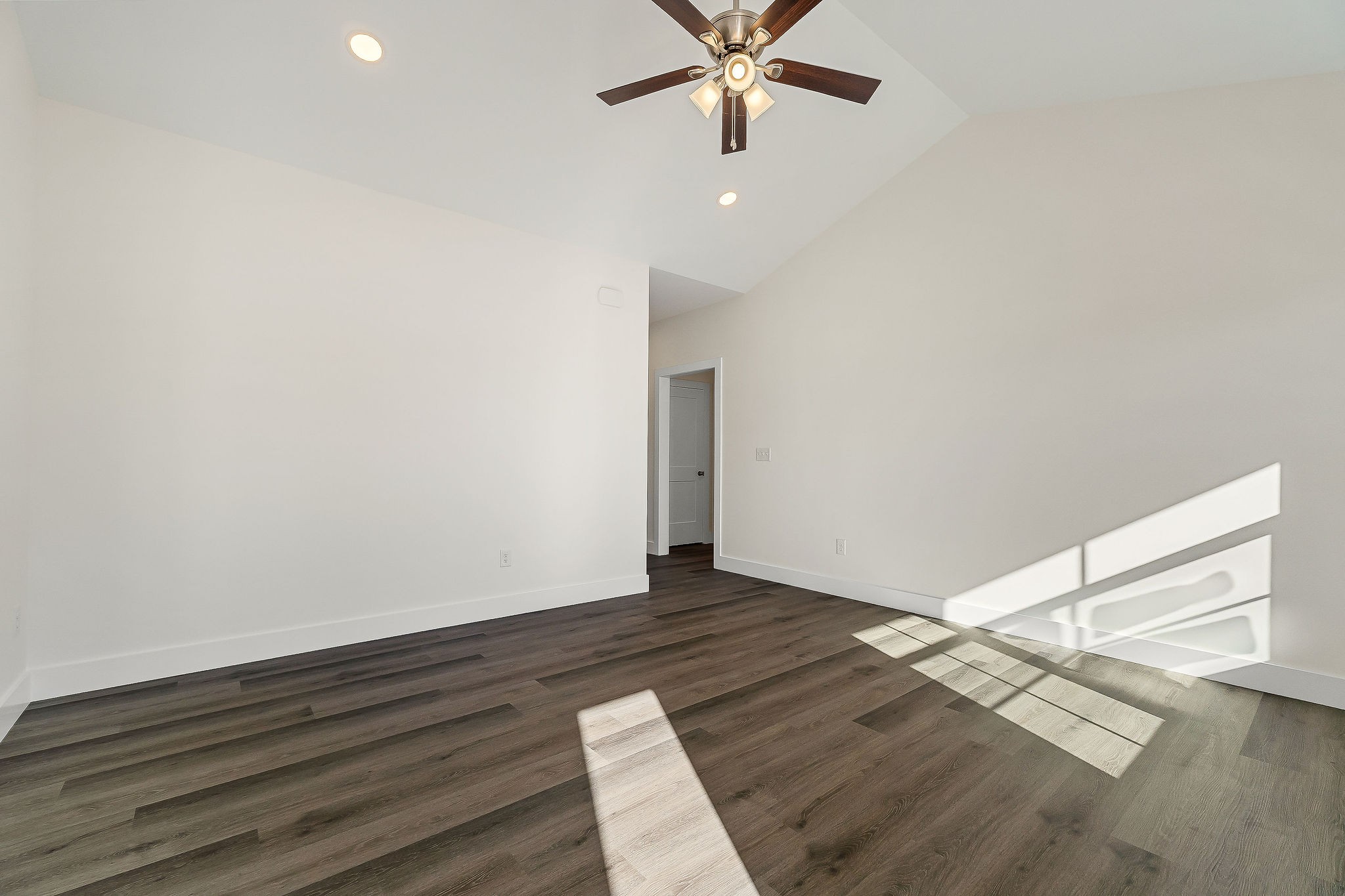 275 Johnson Chapel Road Sparta, TN 38583 - Photo 4 of 21 an empty room with wooden floor closet and windows