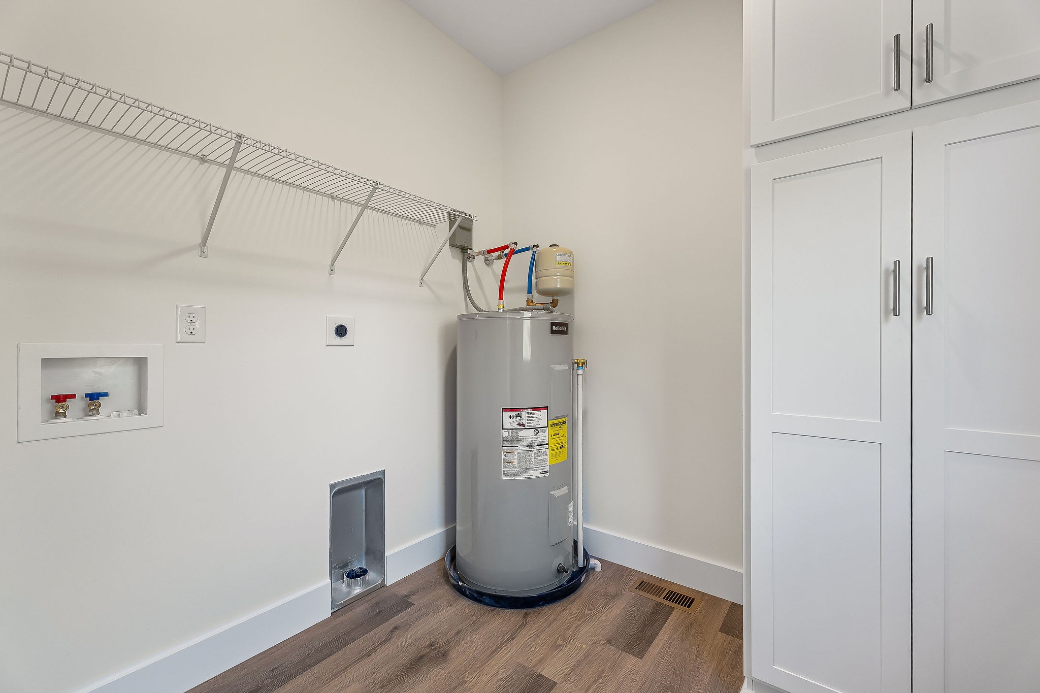 275 Johnson Chapel Road Sparta, TN 38583 - Photo 10 of 21 a view of storage and utility room with wooden floor