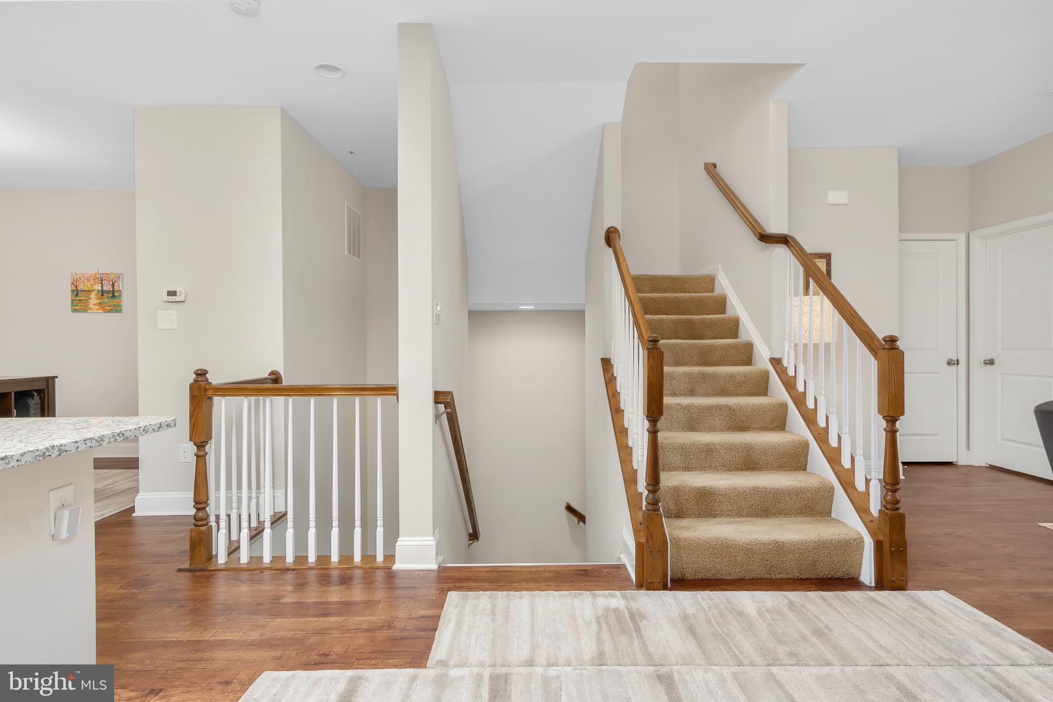 4615 Cambria Road Frederick, MD 21703 - Photo 12 of 33 a view of entryway and hall with wooden floor