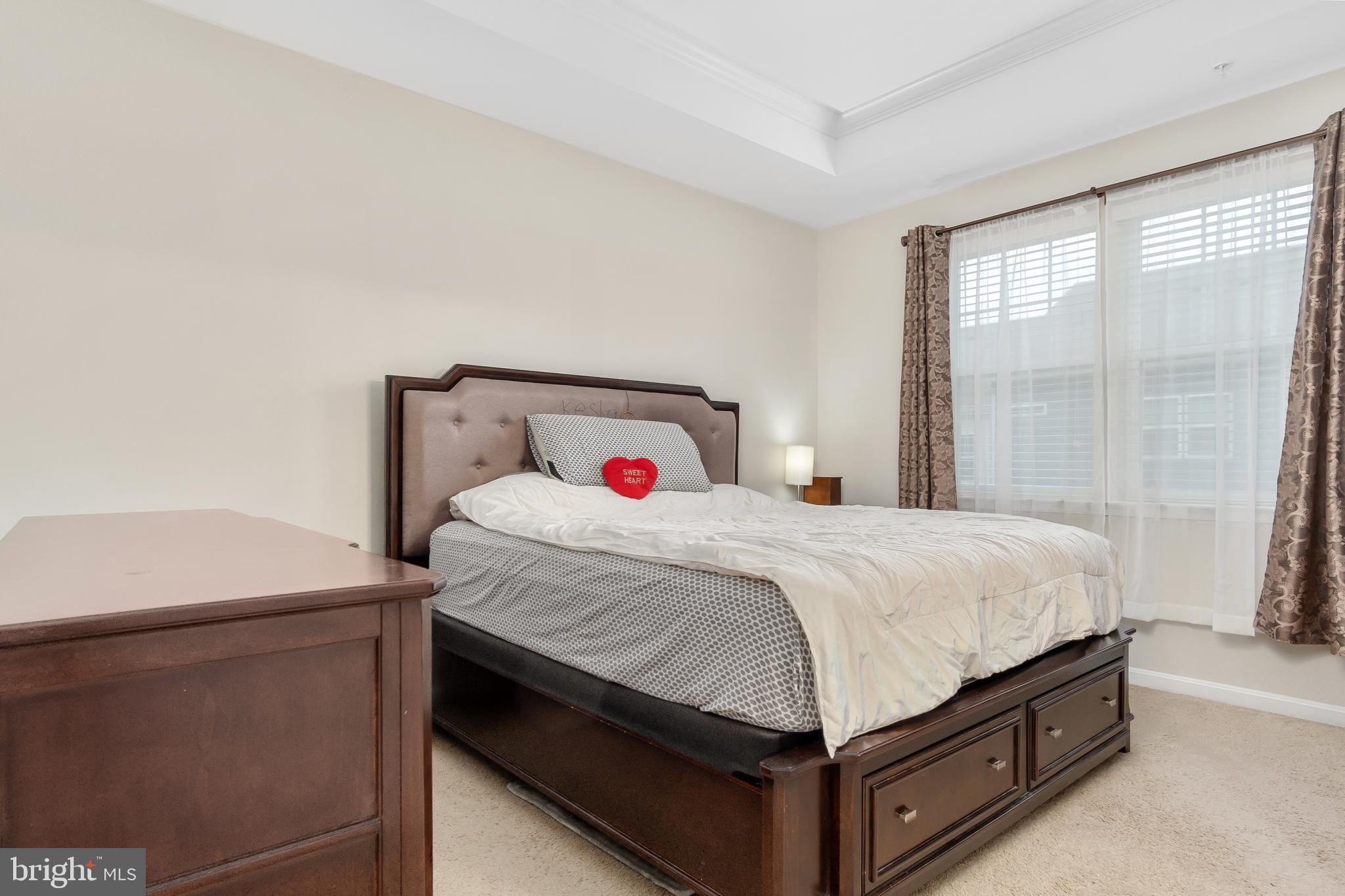 4615 Cambria Road Frederick, MD 21703 - Photo 15 of 33 a bedroom with a bed and large window