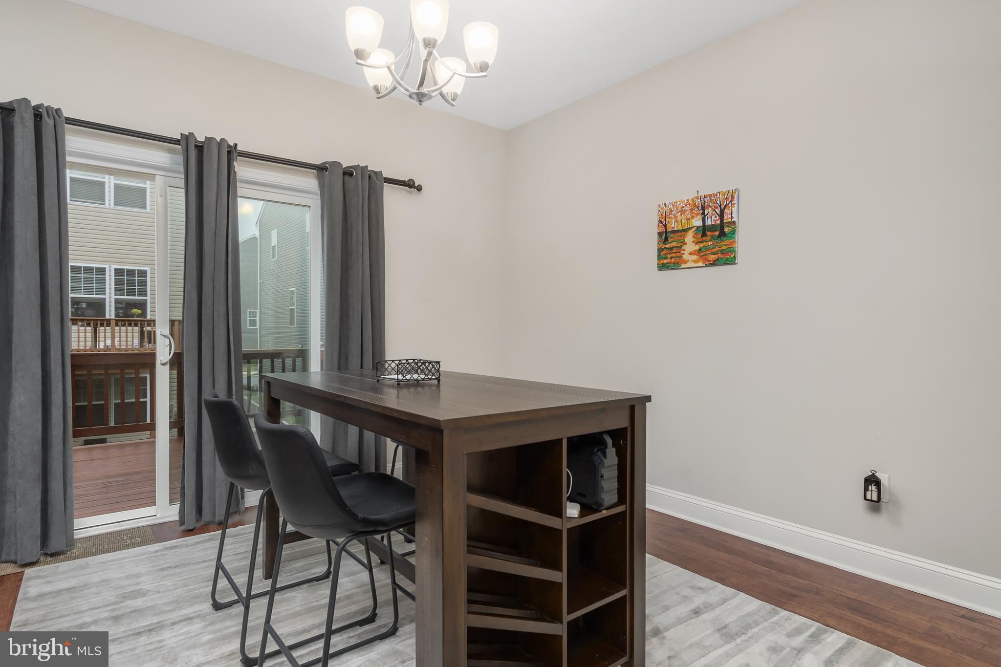 4615 Cambria Road Frederick, MD 21703 - Photo 8 of 33 a view of a workspace with furniture and wooden floor