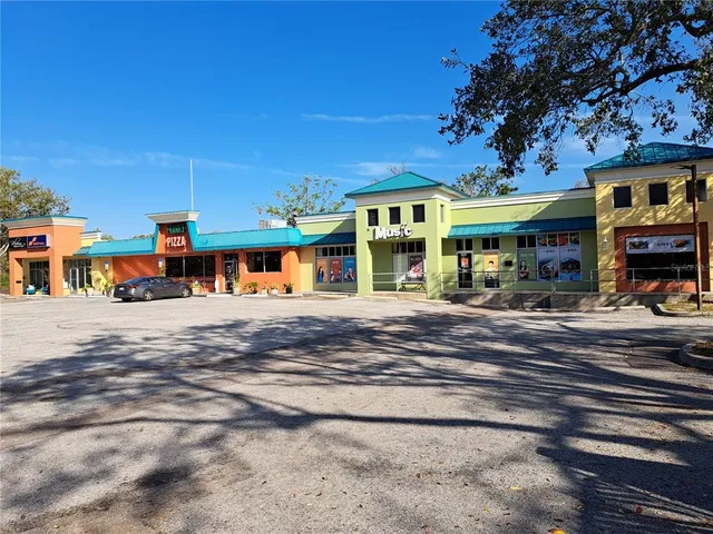 a sign broad on the side of the road