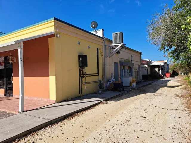 a view of a workspace with furniture