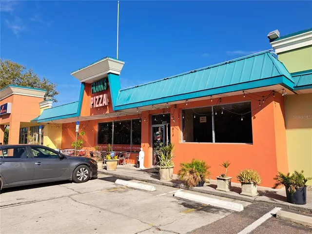 a bathroom with a toilet sink and vanity