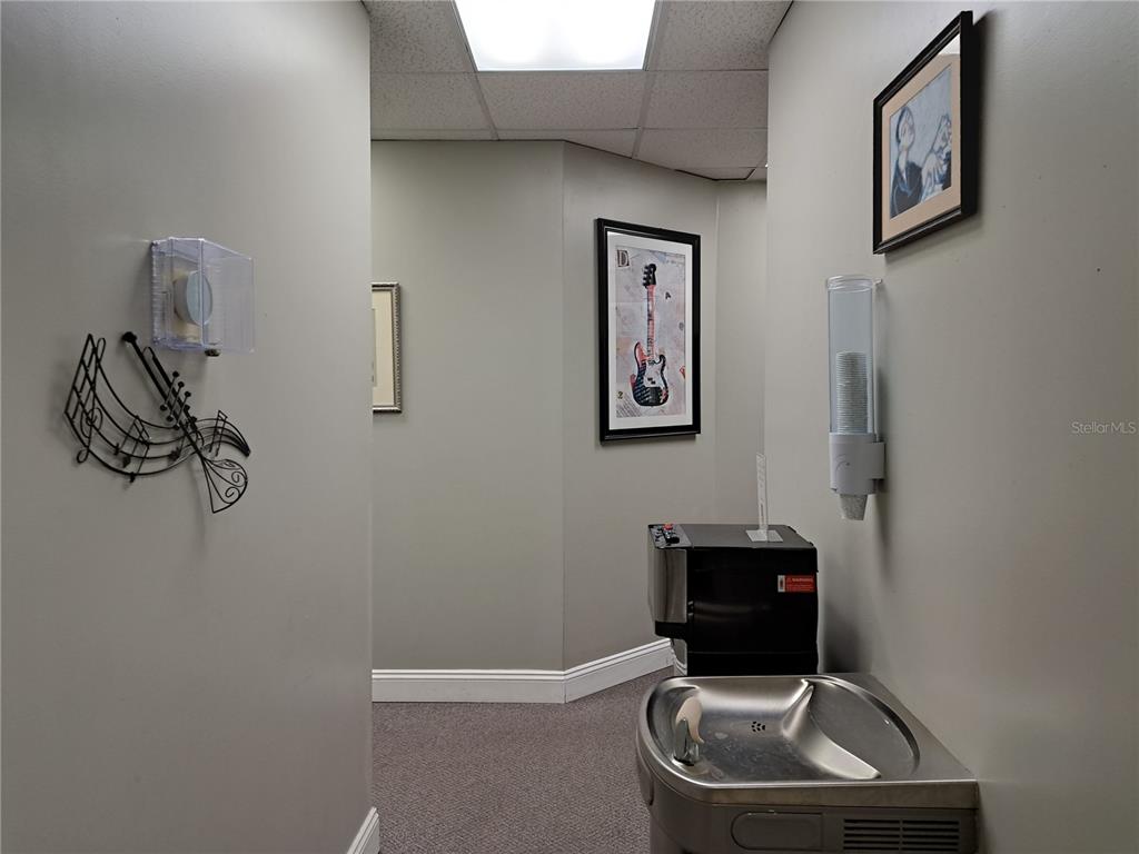 1600 Achieva Way Dunedin, FL 34698 - Photo 32 of 98 a bathroom with a toilet and a sink