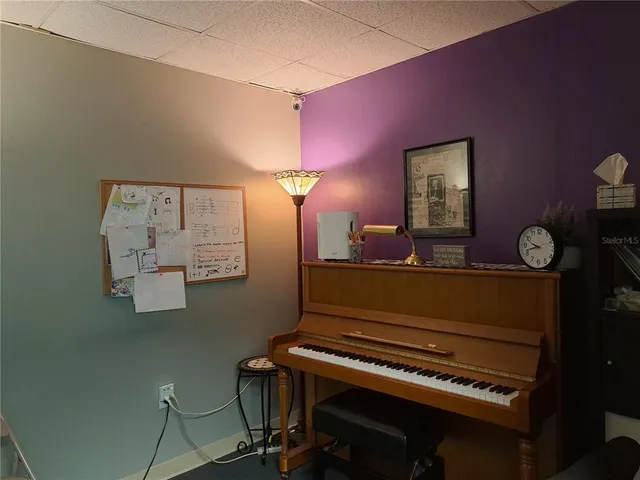 a living room with lots of furniture and appliances