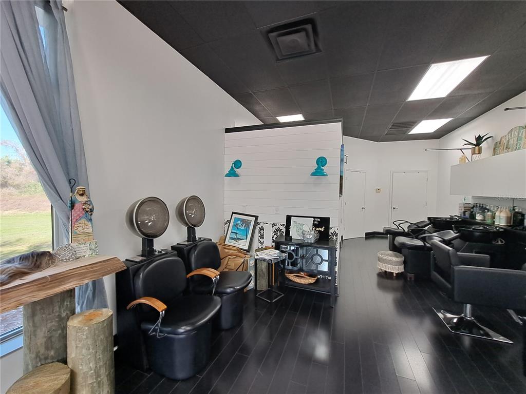 1600 Achieva Way Dunedin, FL 34698 - Photo 94 of 98 a living room with lots of furniture and a large window
