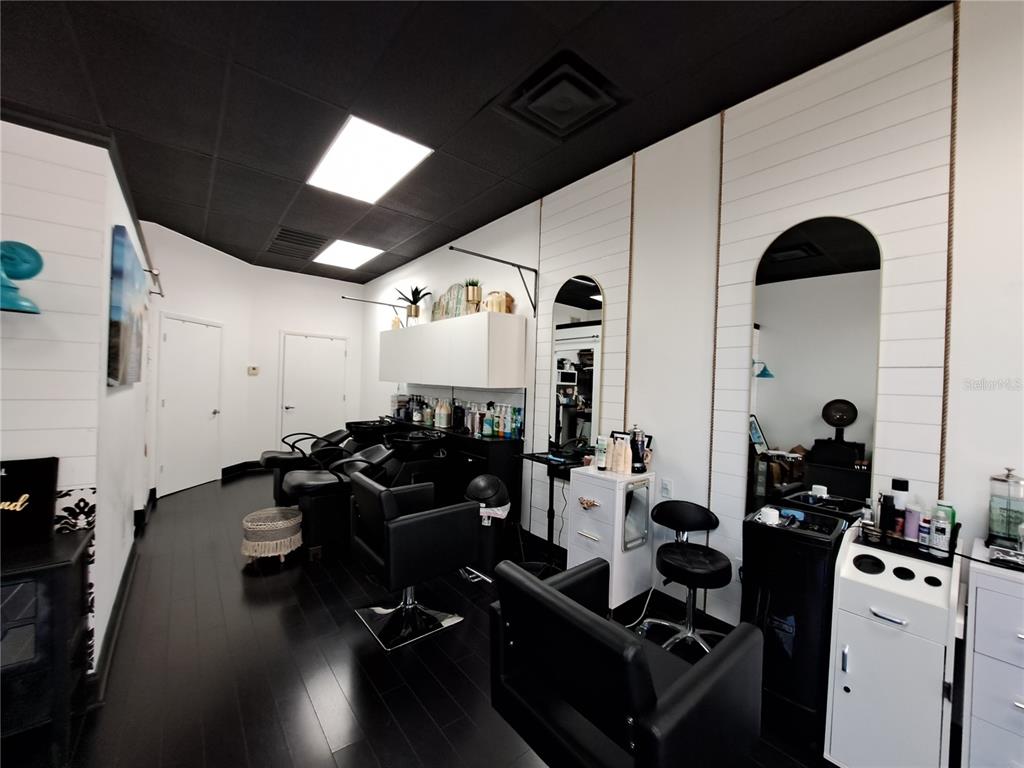 1600 Achieva Way Dunedin, FL 34698 - Photo 95 of 98 a room with gym equipment and view of living room