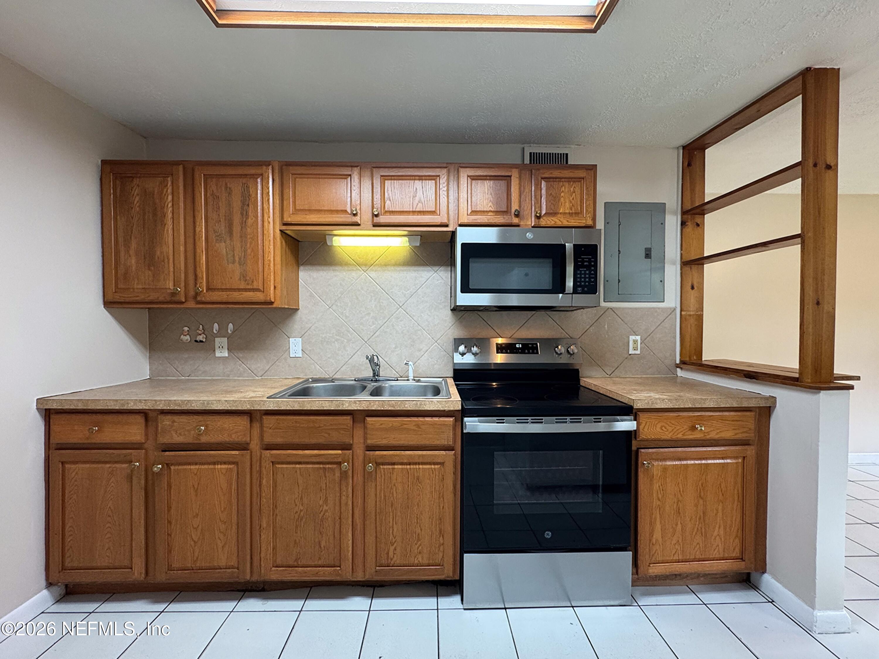 4464 Spring Glen Road, Unit 4464 Jacksonville, FL 32207 - Photo 7 of 15 IMG_2943