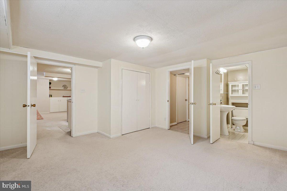 1707 Sanford Road Silver Spring, MD 20902 - Photo 38 of 55 Fourth Bedroom with Full Bath and Exit to Backyard