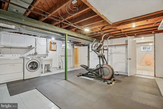 a view of a patio with table and chairs with wooden floor and fence