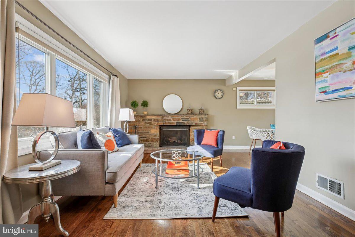 1707 Sanford Road Silver Spring, MD 20902 - Photo 6 of 55 Sunny Living Room with Stone Fireplace