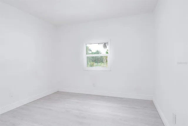 an empty room with a window