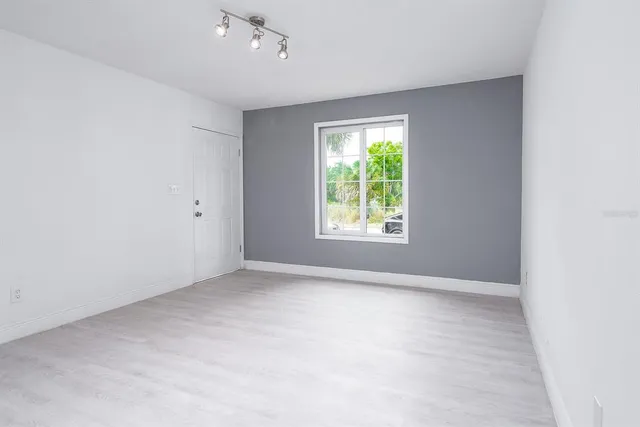 an empty room with windows