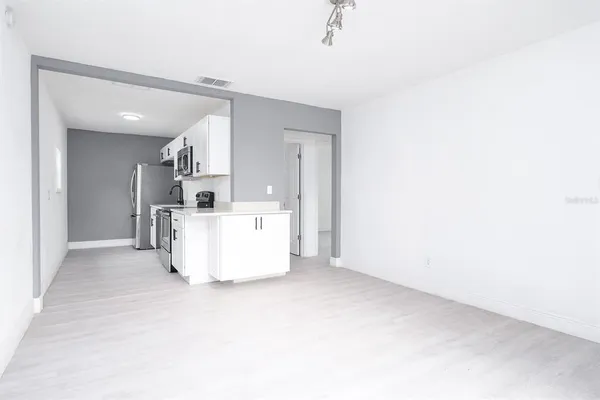 a view of a kitchen with a sink