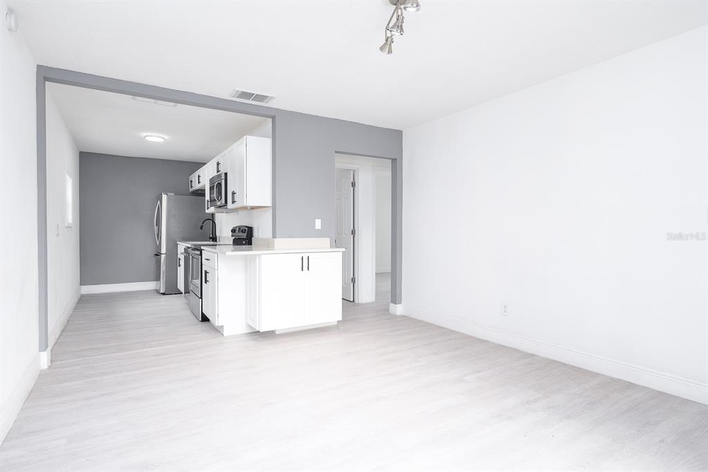 519 Williams Street Melbourne, FL 32901 - Photo 3 of 15 a view of a kitchen with a sink