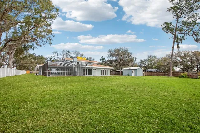 a view of entryway and hall with dining room