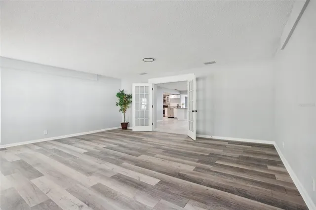 a bathroom with a double vanity sink toilet and shower