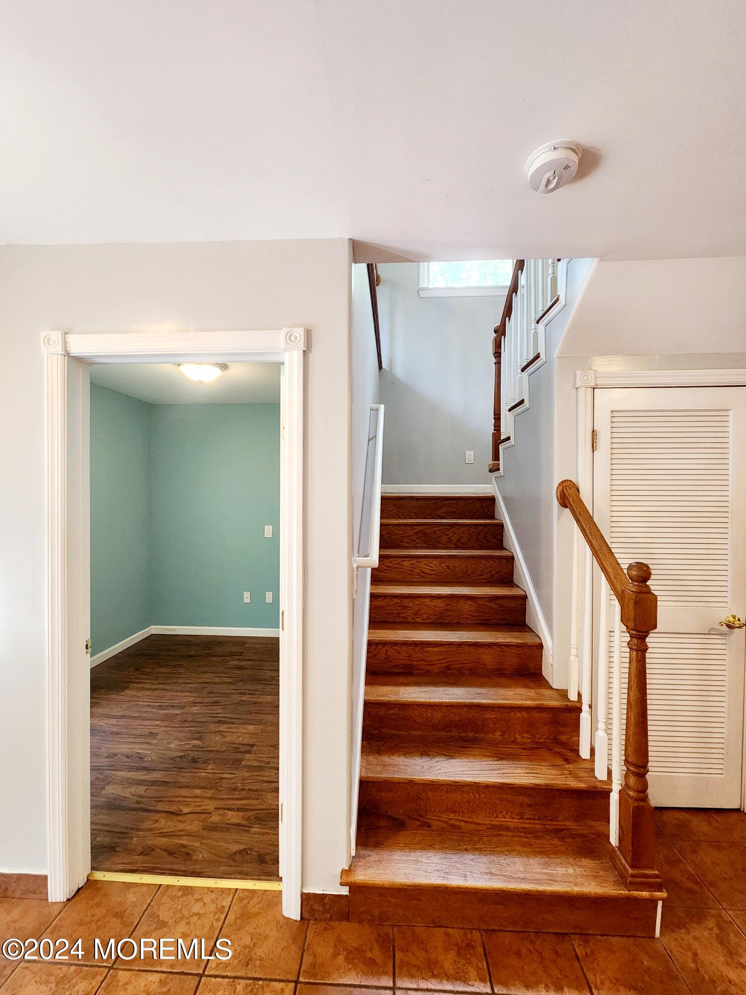 9 Francis Mills Road Freehold, NJ 07728 - Photo 13 of 39 a view of staircase with white walls and railing