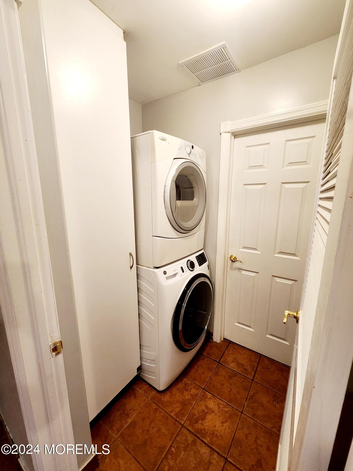 9 Francis Mills Road Freehold, NJ 07728 - Photo 14 of 39 a utility room with dryer and washer