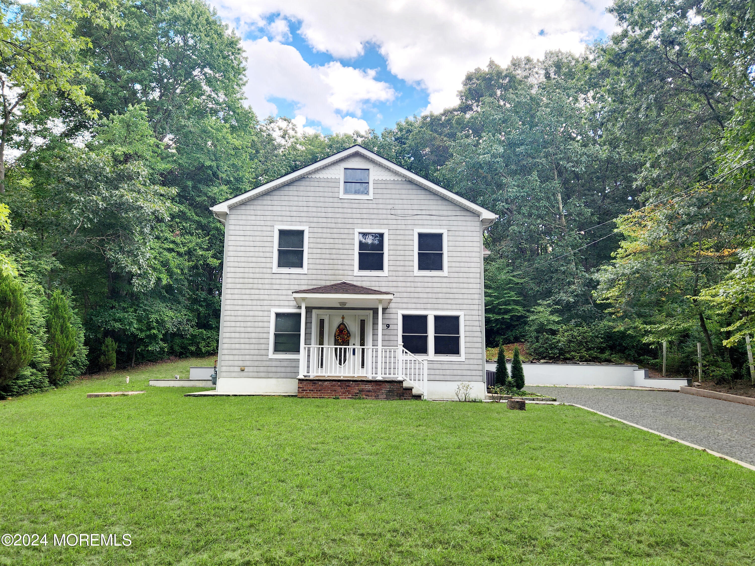 9 Francis Mills Road Freehold, NJ 07728 - Photo 38 of 39 a front view of a house with a yard