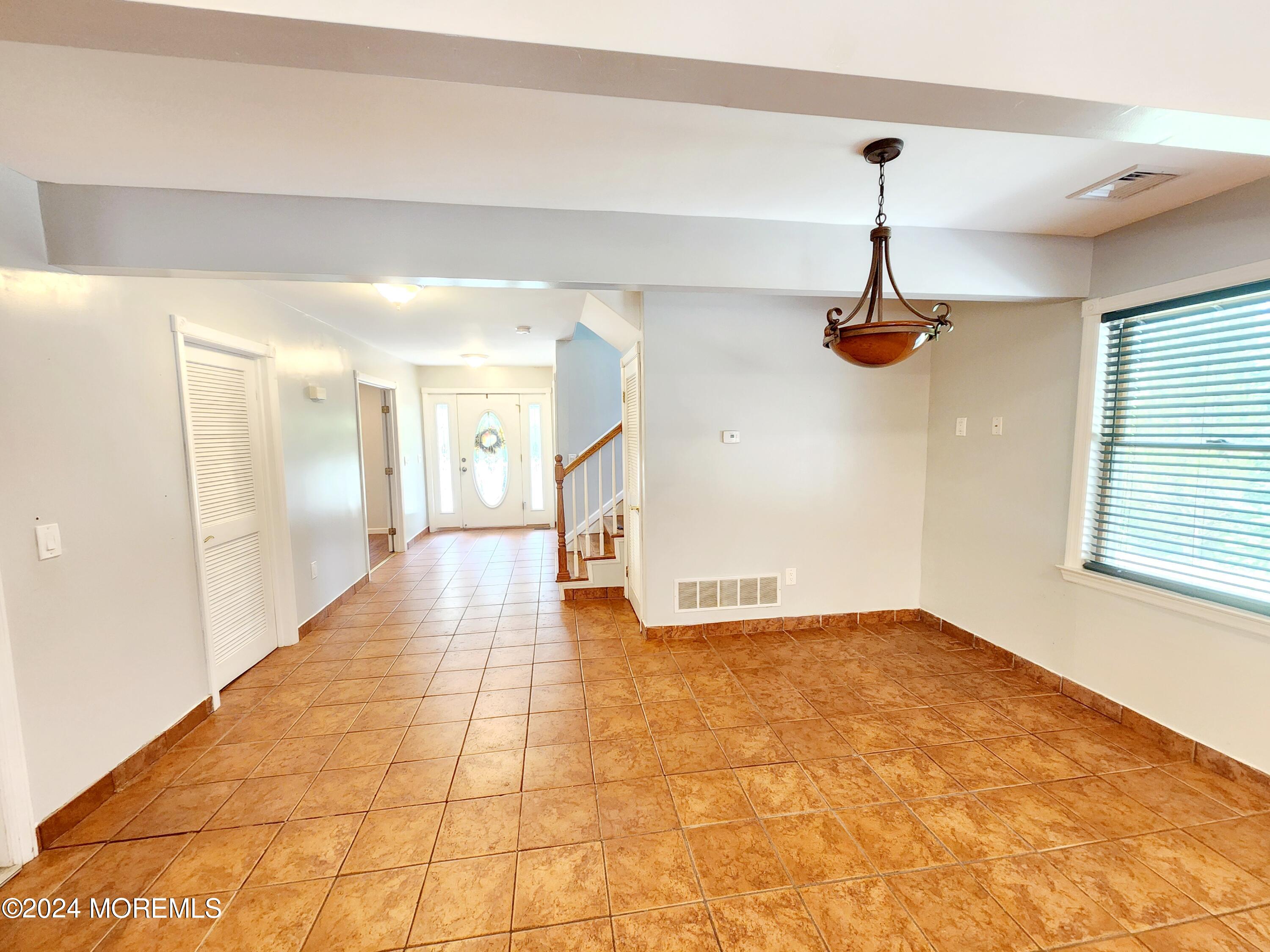 9 Francis Mills Road Freehold, NJ 07728 - Photo 9 of 39 a view of an empty room and window