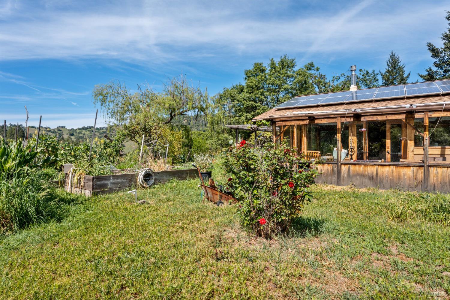3751 Low Gap Road Ukiah, CA 95482 - Photo 11 of 22 a view of a house with a yard
