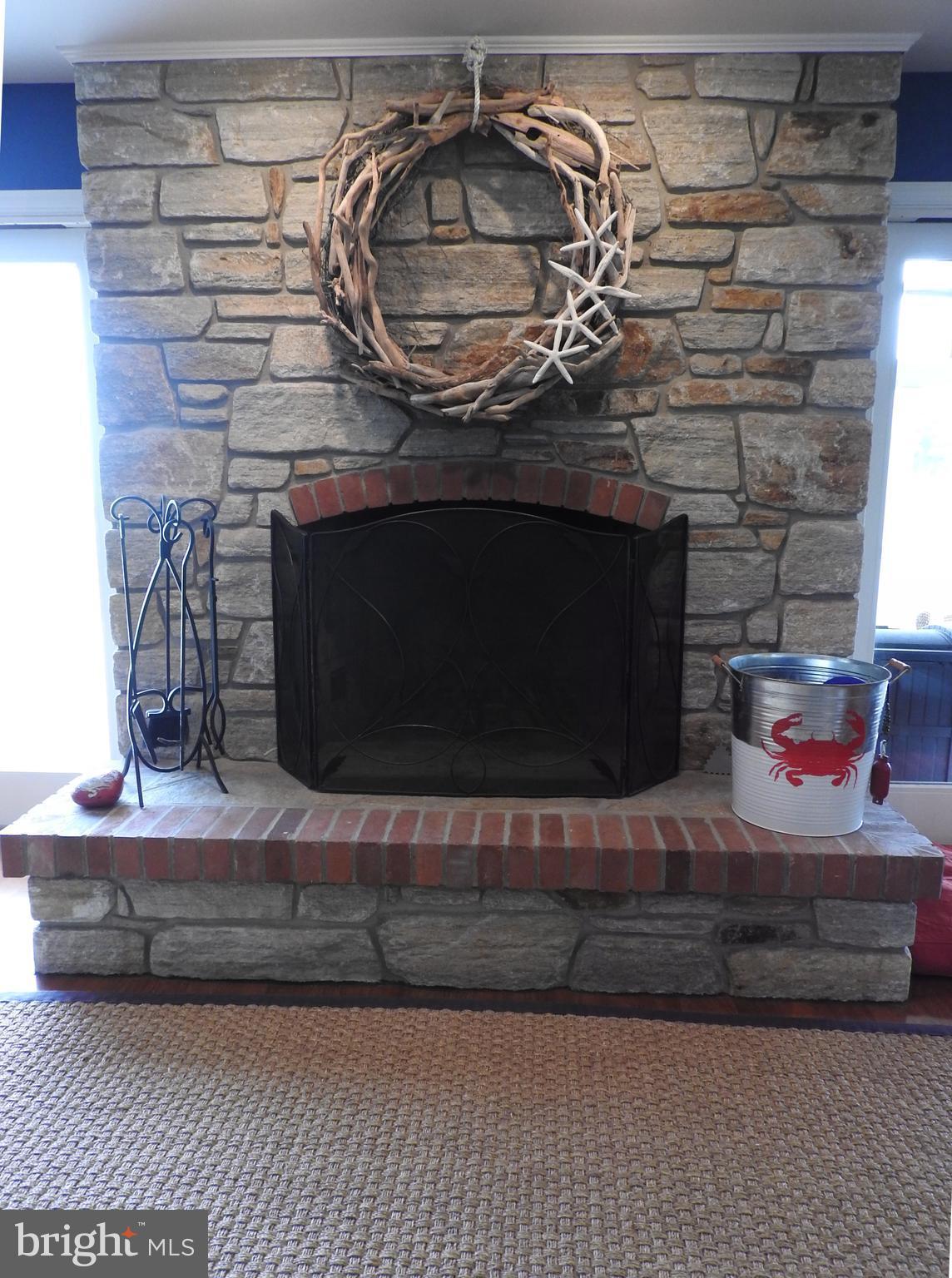 726 Twin Point Cove Road Cambridge, MD 21613 - Photo 22 of 35 Toasty wood burning F.P.