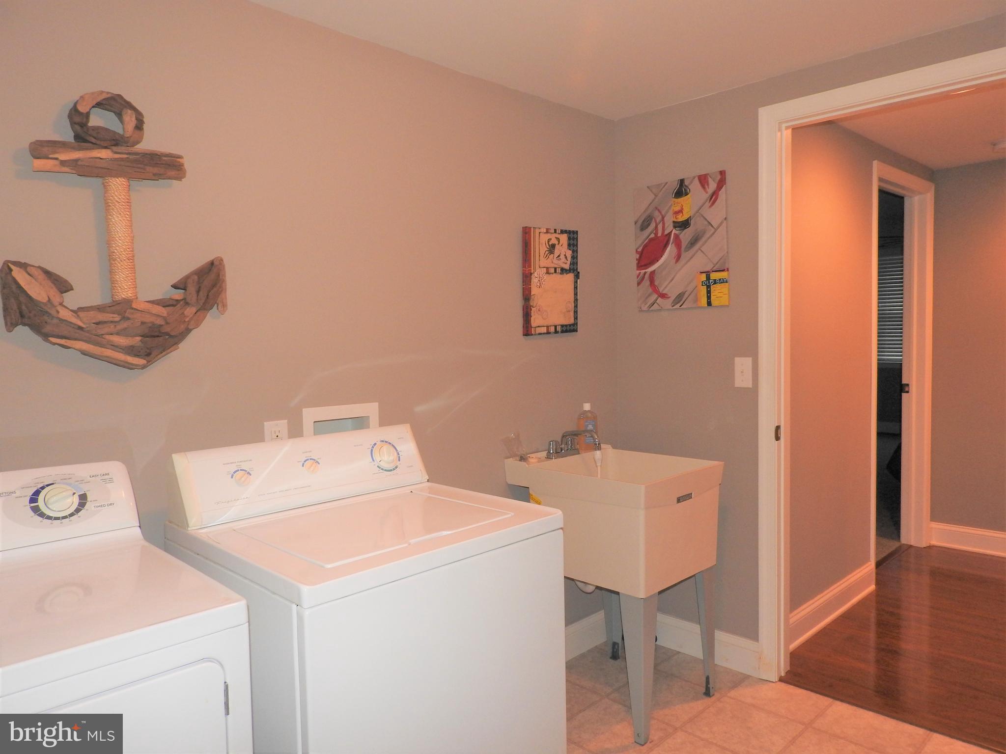 726 Twin Point Cove Road Cambridge, MD 21613 - Photo 31 of 35 Separate Laundry Room w utility sink