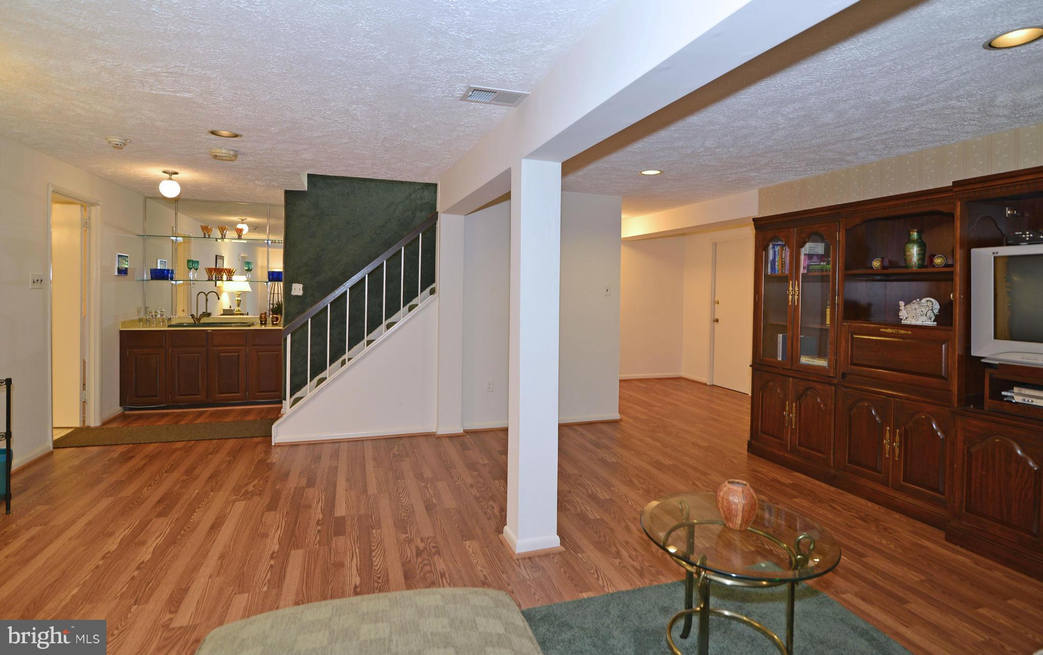 2446 Freetown Drive Reston, VA 20191 - Photo 20 of 30 Rec Rm w/ pergo flooring