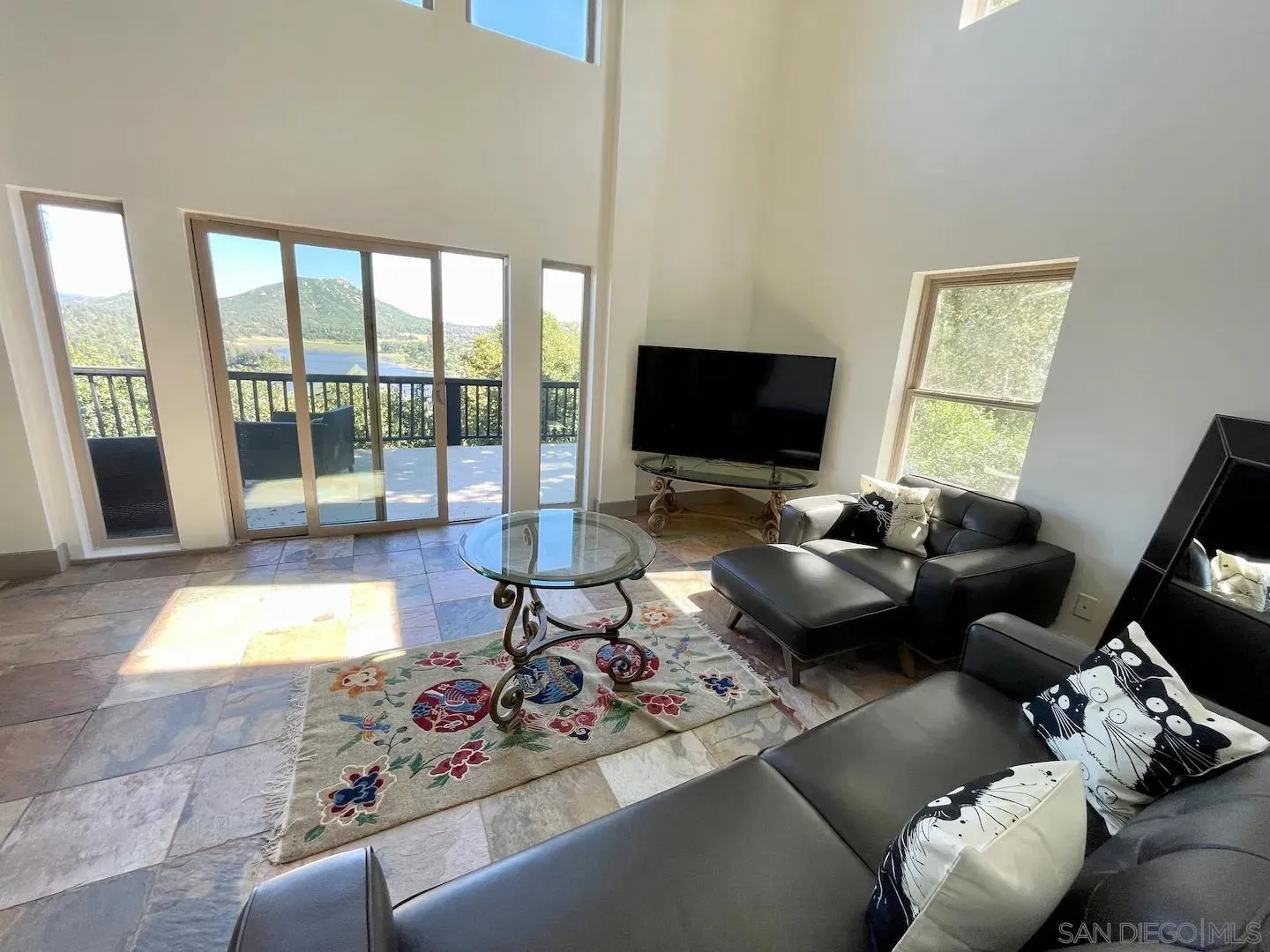 34619 Yuma Road Julian, CA 92036 - Photo 7 of 23 a living room with furniture and a flat screen tv