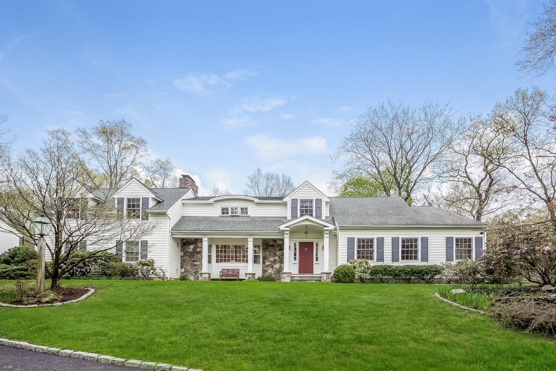 11 Pondfield Lane Darien, CT 06820 - Photo 1 of 31 a front view of a house with a garden