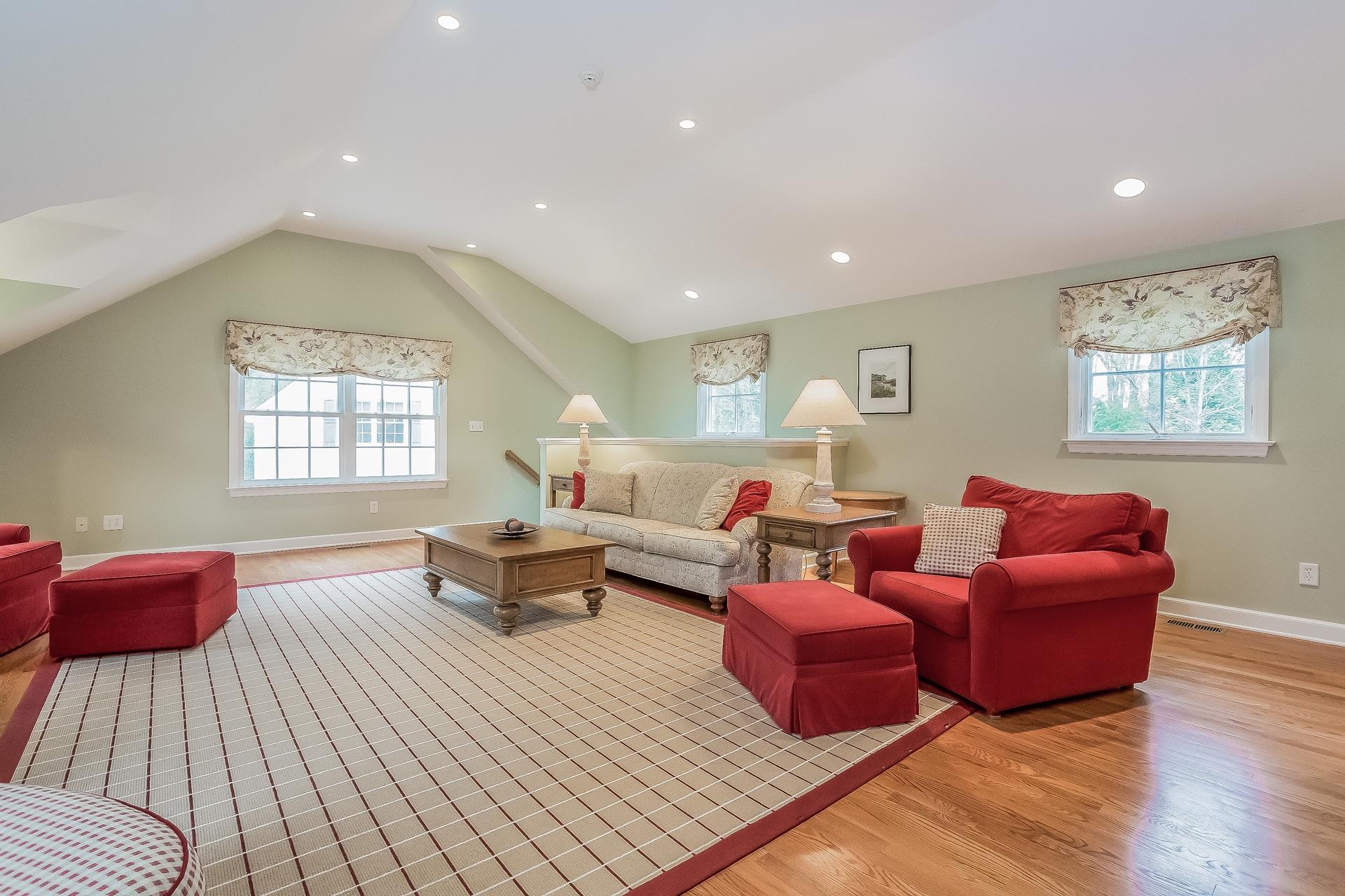 11 Pondfield Lane Darien, CT 06820 - Photo 12 of 31 a living room with furniture and a window