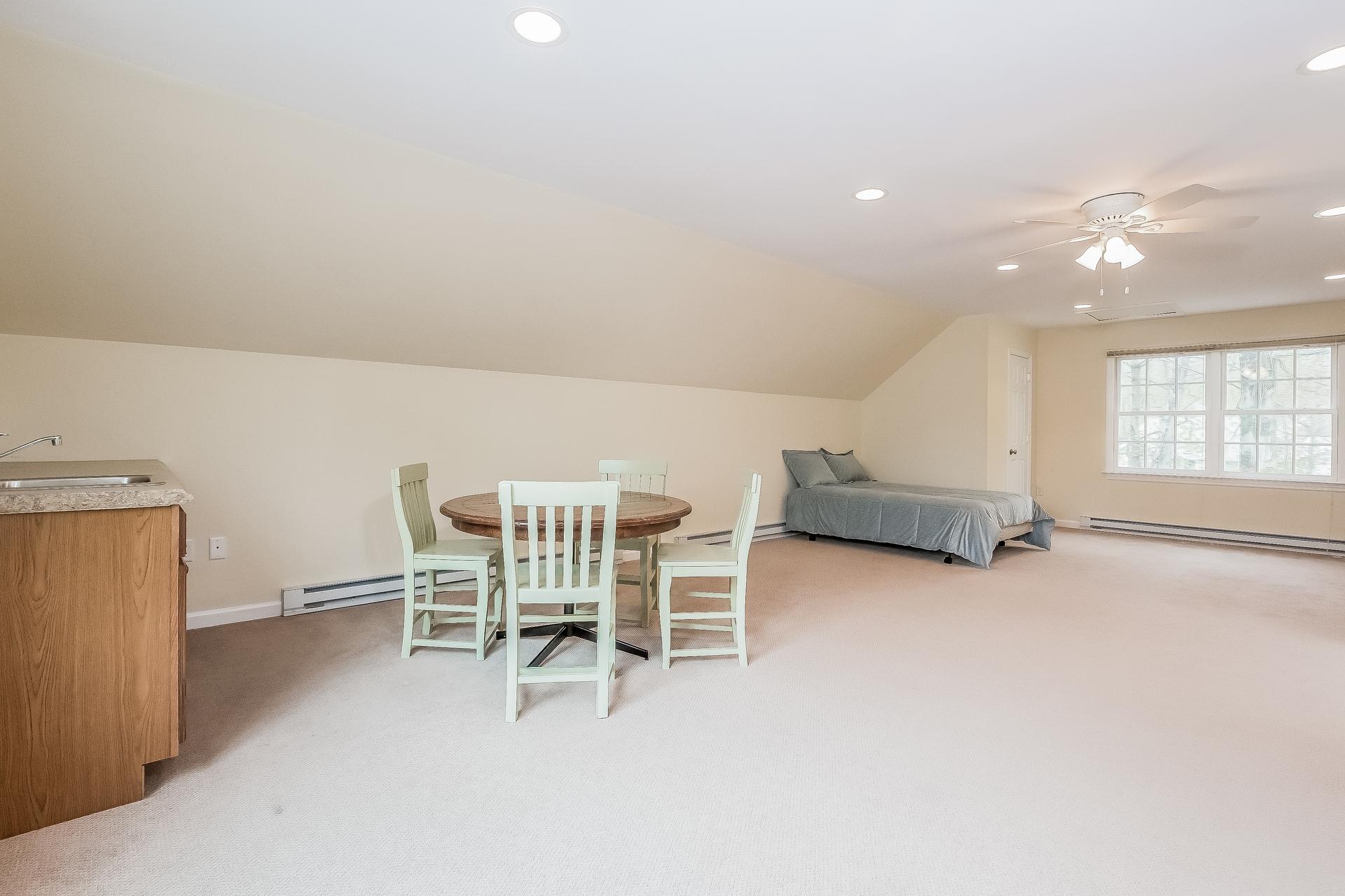 11 Pondfield Lane Darien, CT 06820 - Photo 23 of 31 a dining room with furniture and window