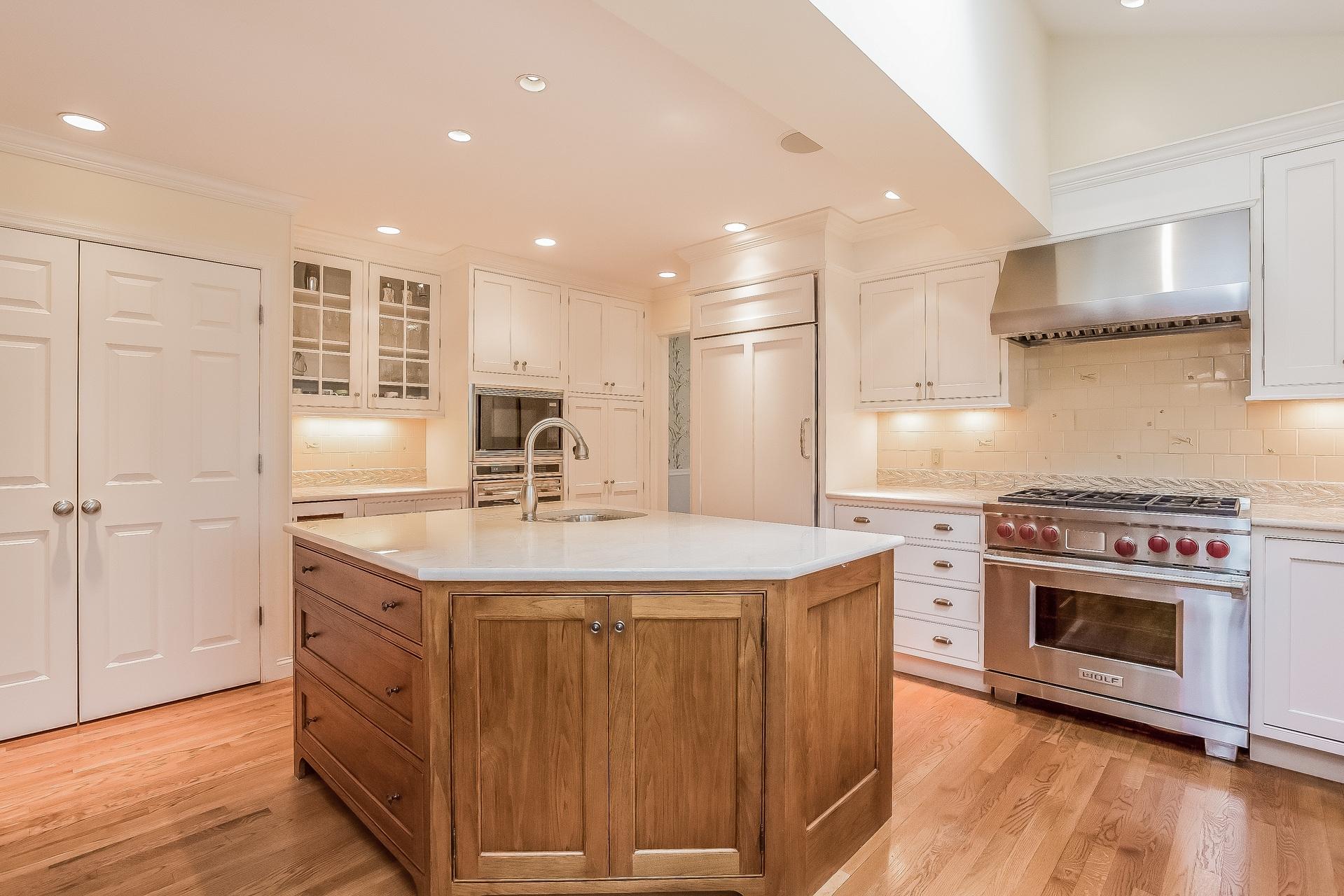 11 Pondfield Lane Darien, CT 06820 - Photo 9 of 31 a kitchen with a stove and a sink