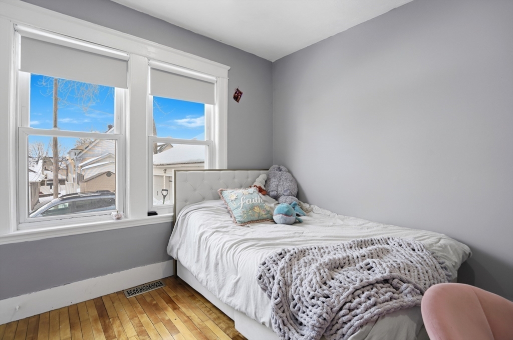 24 Ingleside Avenue Worcester, MA 01604 - Photo 21 of 39 a bedroom with a bed and window