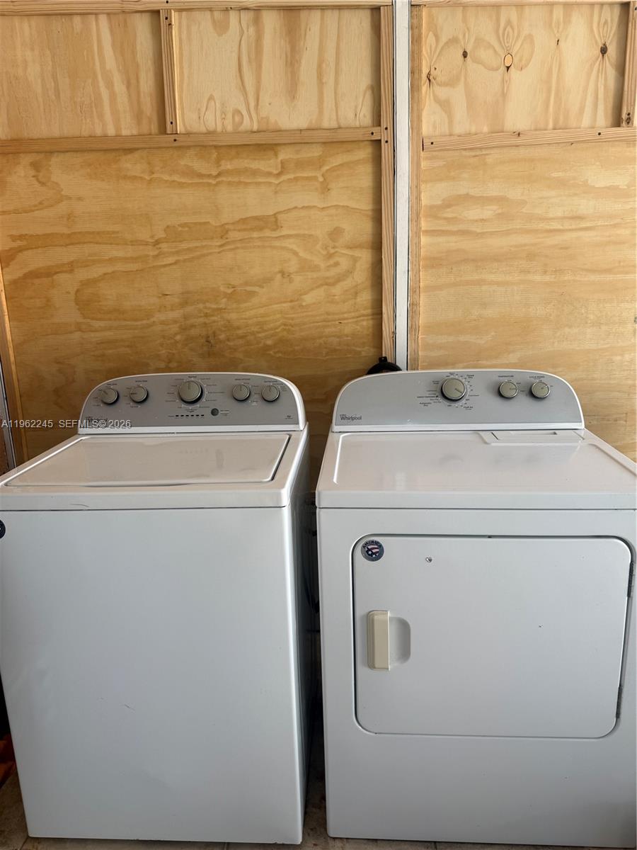 2551 West 64th Place Hialeah, FL 33016 - Photo 18 of 20 a utility room with dryer and washer