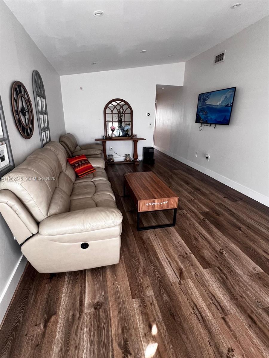 2551 West 64th Place Hialeah, FL 33016 - Photo 3 of 20 a living room with furniture