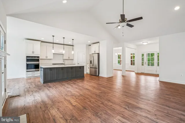 a view of kitchen with cabinets and stainless steel appliances
