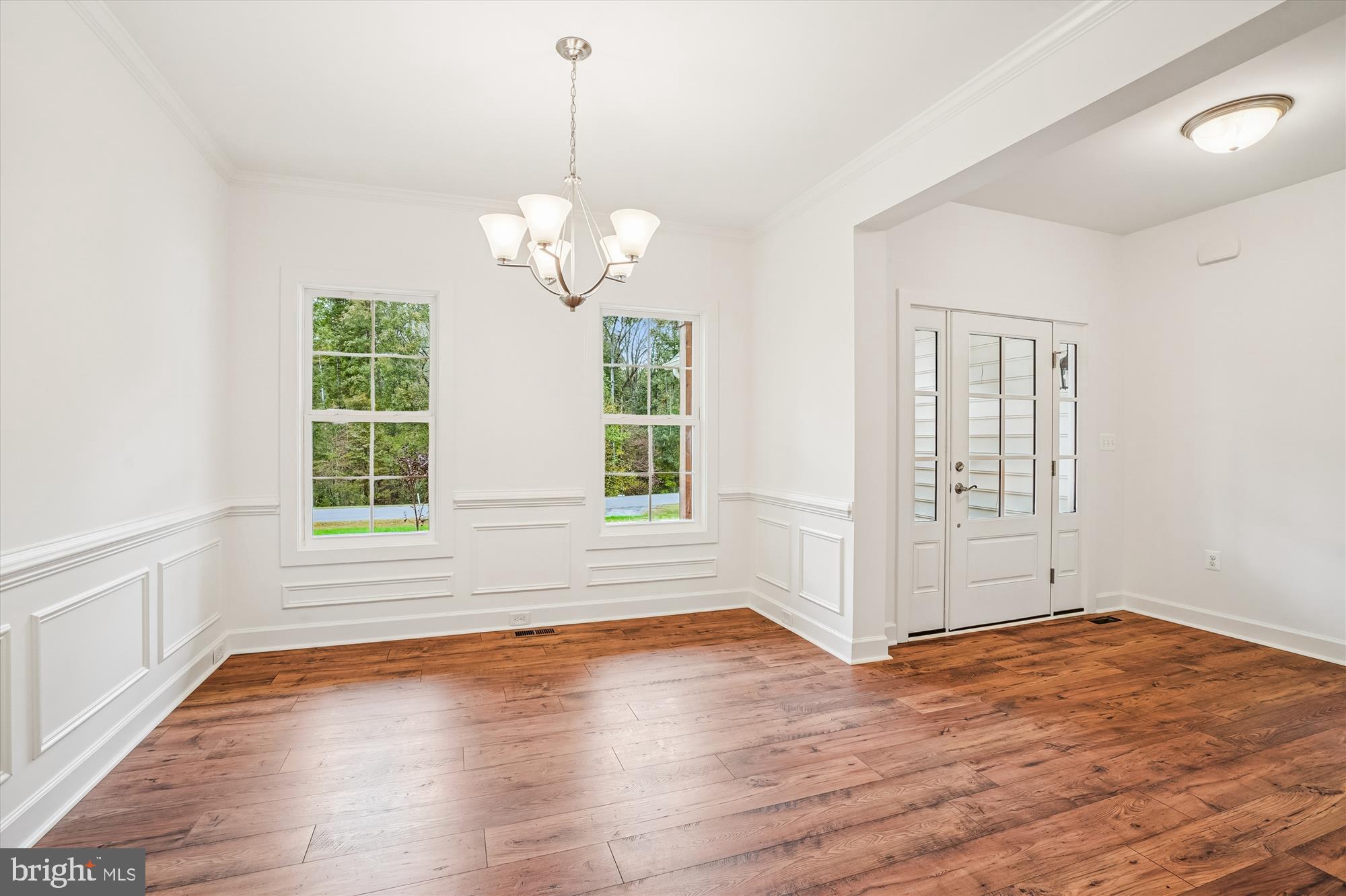 15017 Rillhurst Drive Culpeper, VA 22701 - Photo 14 of 34 a view of empty room with wooden floor and window