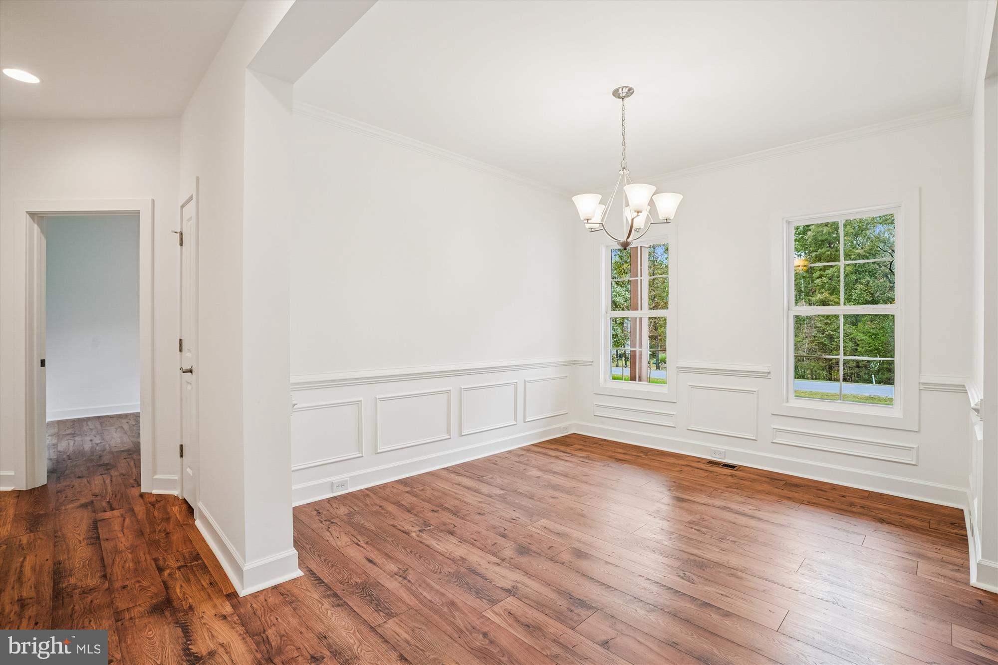 15017 Rillhurst Drive Culpeper, VA 22701 - Photo 15 of 34 wooden floor in an empty room with a window