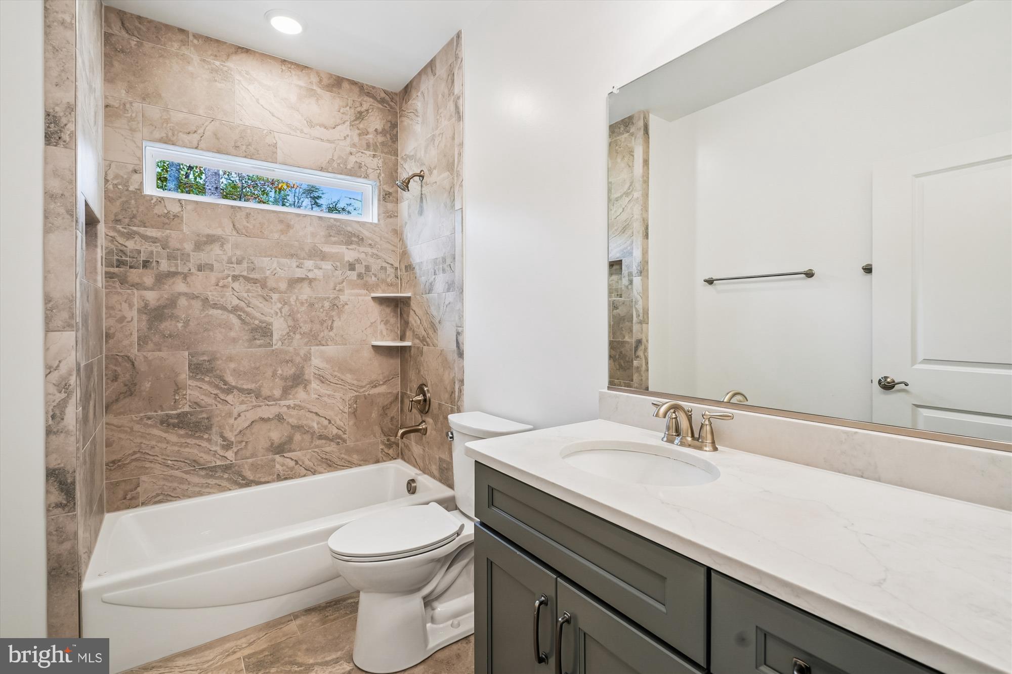 15017 Rillhurst Drive Culpeper, VA 22701 - Photo 23 of 34 a bathroom with a sink a toilet and shower