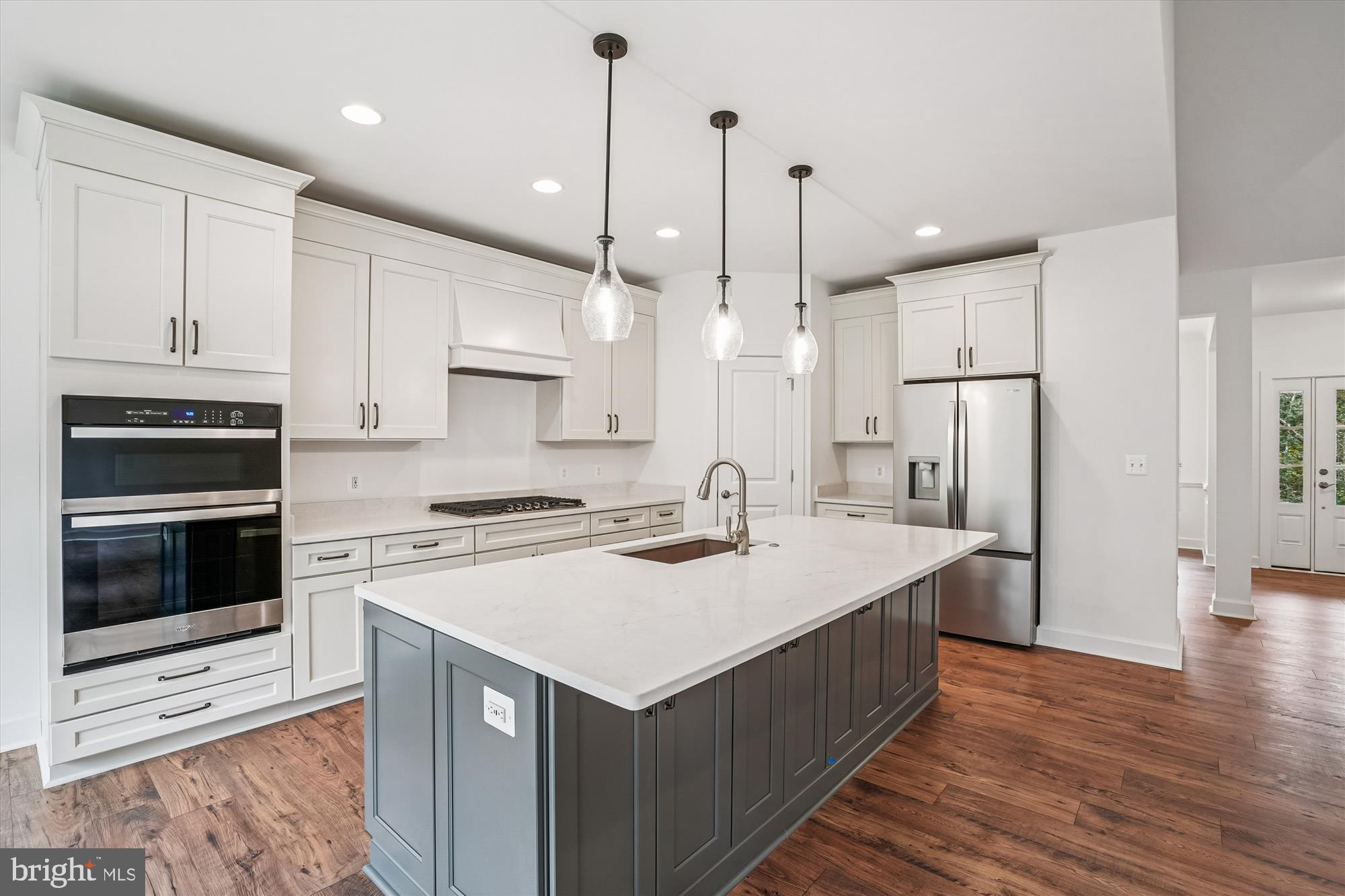 15017 Rillhurst Drive Culpeper, VA 22701 - Photo 3 of 34 a kitchen with a stove a refrigerator and a sink