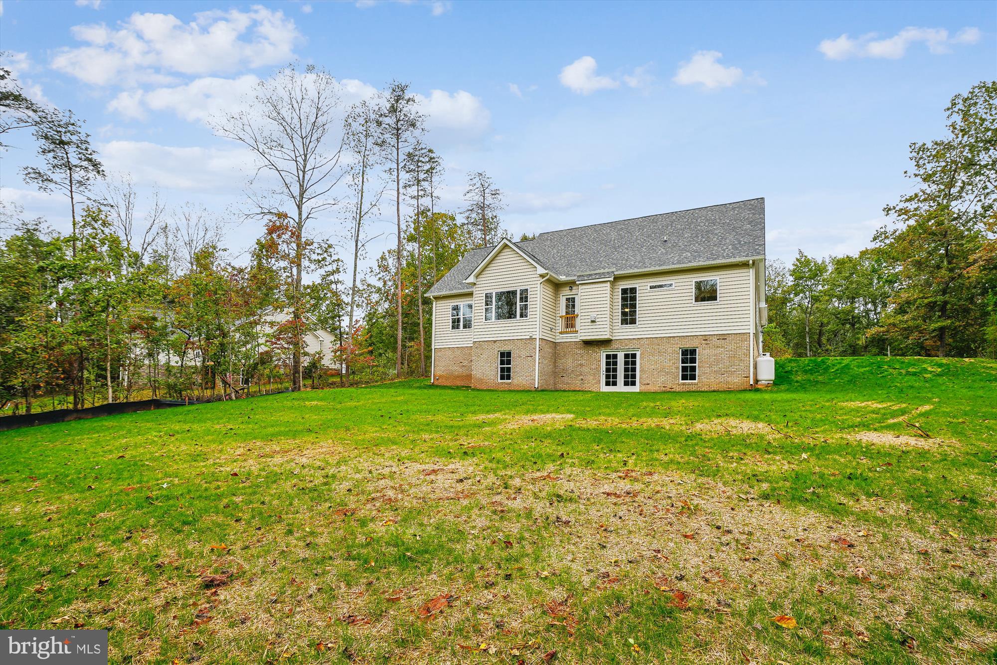 15017 Rillhurst Drive Culpeper, VA 22701 - Photo 31 of 34 a view of a house with a big yard