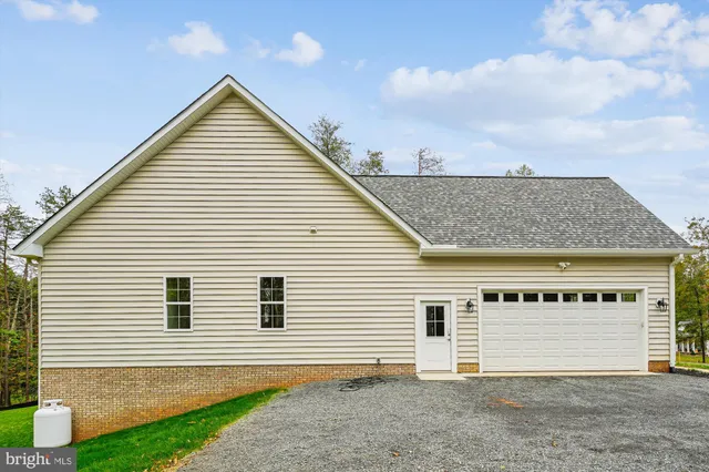 a view of a house with a garage