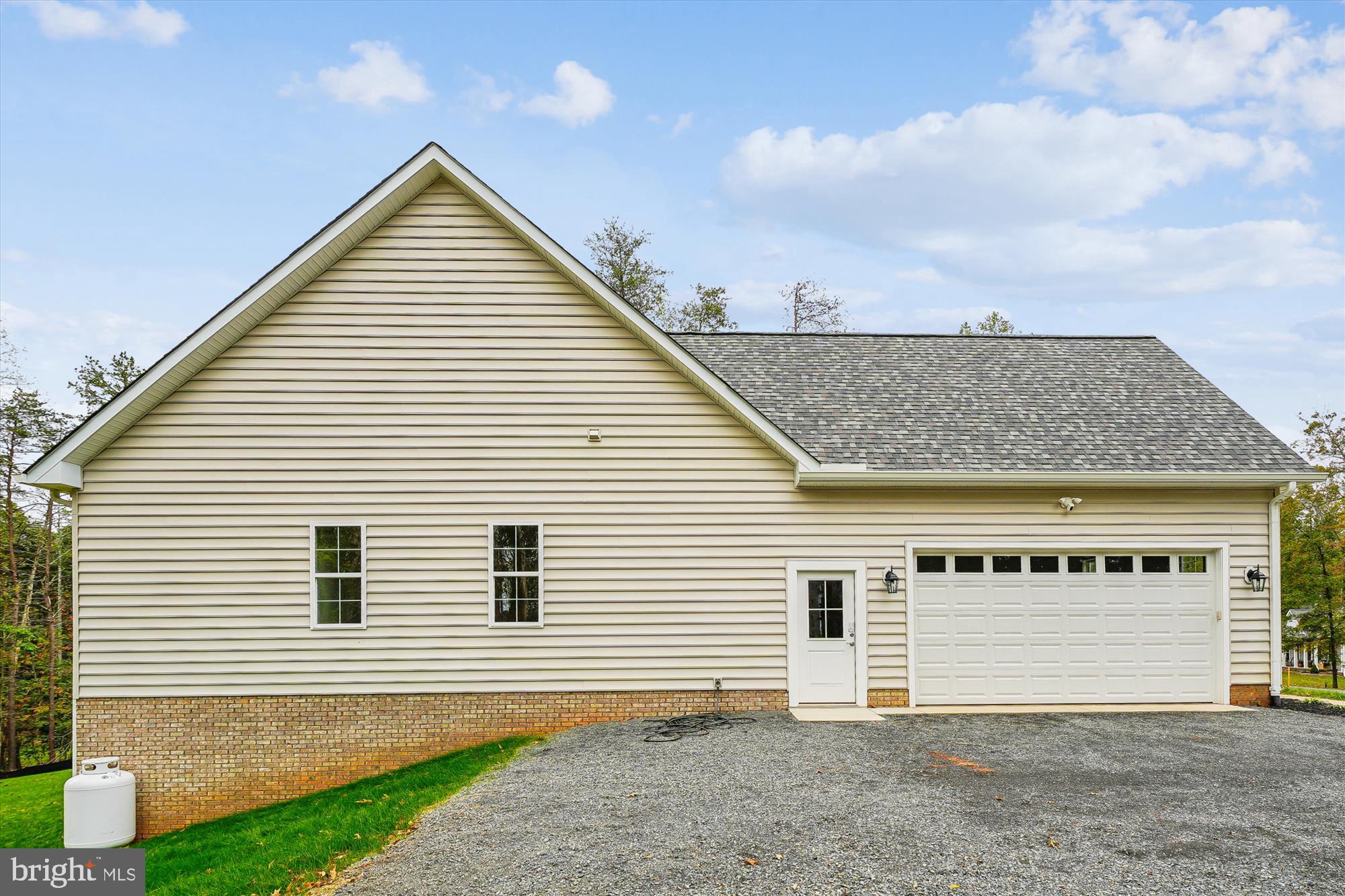 15017 Rillhurst Drive Culpeper, VA 22701 - Photo 33 of 34 a view of a house with a garage