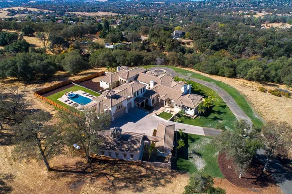 a view of a house with a swimming pool