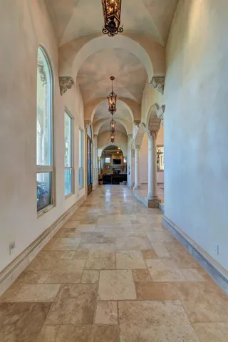 a living room with furniture fireplace and flat screen tv